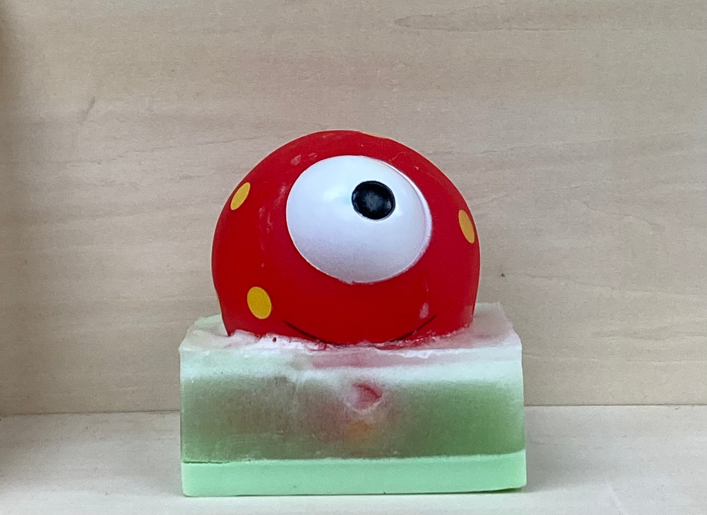 Octopus Monster Squirt Toy on Glow-in-the-Dark Soap
Price: $10
Description:
Get ready for bathtime thrills with this glow-in-the-dark glycerin soap featuring a playful Octopus Monster Squirt Toy! With its bold red body, cheerful yellow spots, and squirting surprise, this mischievous sea creature is sure to bring joy to every soak. Infused with the tropical, fruity Monkey Farts scent, this soap adds a fun and playful touch to bath time.
Why You’ll Love It:
Octopus Monster Squirt Toy – A fun, interactive