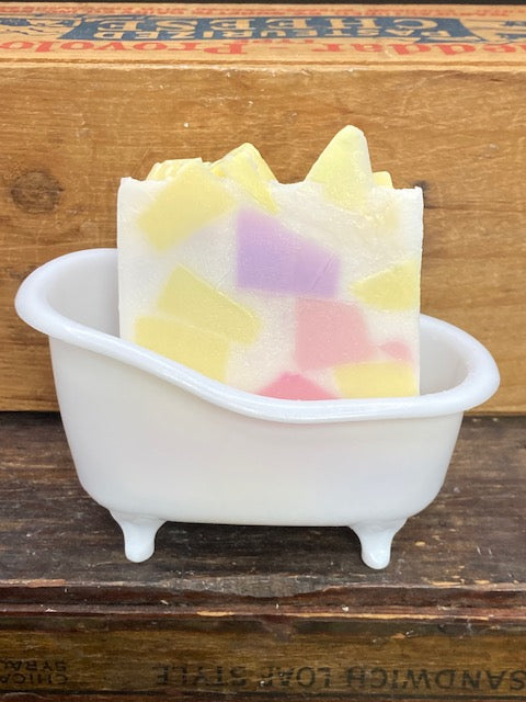 This is a 4 oz bar of Candy Crush scented Goats Milk Soap. This is a sweet scent in a moisturizing bar of soap. Super fun! Each item is individually made and may appear different from the photo.