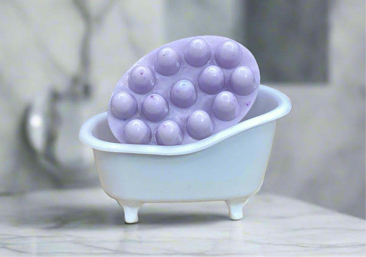 A soothing massage bar of Lavender Scented Goats Milk, Aloe, and Olive Oil Soap.  This is the bar with the bumps that makes a wonderful Spa-like experience.  Lavender is always a popular scent!

$7

Each item is individually made and may appear different from the photo.