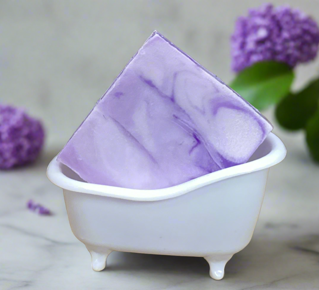 This is a 4 oz bar of Lilac  scented Goats Milk Soap.  This is a classic scent in a moisturizing bar of soap.  It makes bathtime a spa-like experience!

Each item is individually made and may appear different from the photo.