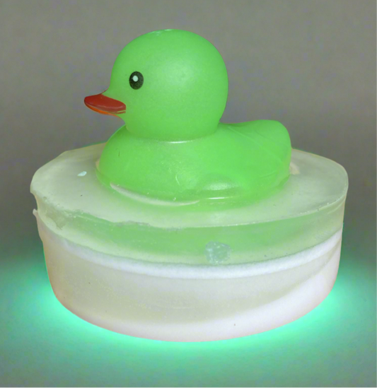 Glow in the Dark Rubber Duck Toy on a bar of Bubble  scented glow in the dark glycerin soap.

These would make awesome party favors.

$8 each.

Each item is individually made and may appear different from the photo.