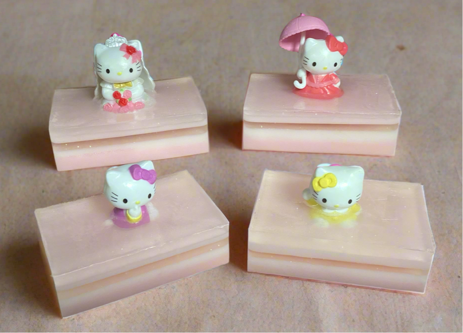 Hello Kitty Toy on a bar of Bubble Gum scented Shea Butter and Glycerin Soap