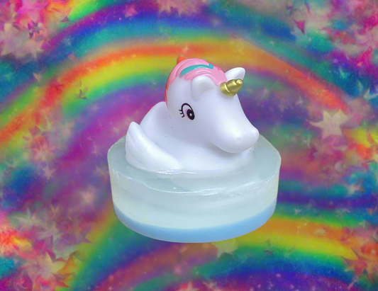 Unicorn Rubber Duck on a bar of Glow in the Dark Shea Butter and Glycerin Soap