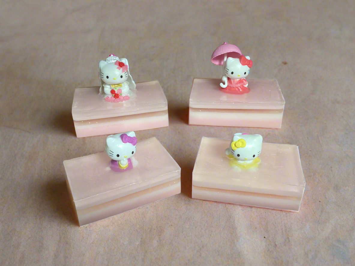 This is a throwback to my childhood!  Hello Kitty toys on a bar of Bubble Gum scented Shea Butter and Glycerin soap. 

$8 each.

Each soap is individually made and may appear different from the photo.  Toy may vary from the photo.

 