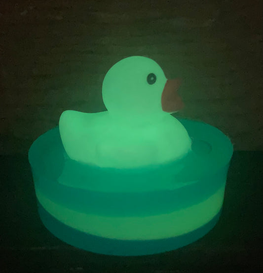 Glow in the Dark Rubber Duck Toy on a bar of Honolulu Sun scented glow in the dark glycerin soap.

These would make awesome party favors.

$8 each.

Each item is individually made and may appear different from the photo.