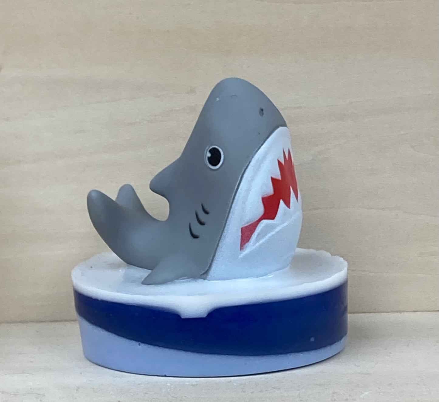 Make bath time an underwater adventure with our Shark Finger Puppet Bath Buddy! Each soap is handcrafted with skin-loving shea butter and glycerin for a rich, moisturizing lather. The playful scent of Monkey Farts (a tropical medley of banana, grapefruit, kiwi, and more) makes bath time irresistibly fun.

Features:

Includes a whimsical shark-themed story to spark imaginations during bath time.
Each soap is individually made, and the shark toy colors may vary, making every bath buddy unique.
Add a little wh