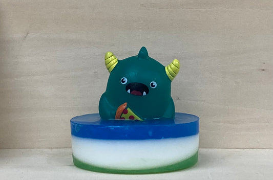 Slice, Suds, and Soak with Vinnie the Pizza-Loving Monster Bath Buddy!

Make bath time a cheesy good time with Vinnie, the Pizza-Loving Monster Bath Buddy! This fun-loving, pizza-obsessed monster is ready to turn your tub into a saucy adventure. Bursting with a sweet Fruit Loops scent, Vinnie perches atop a handcrafted bar of nourishing shea butter and glycerin soap, bringing fun and freshness to every bath.

Features:

Handcrafted shea butter and glycerin soap
Exciting Fruit Loops fragrance
Playful pizza-l