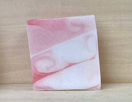 Grapefruit & Rhubarb Goat’s Milk Soap – 5 oz
A Fresh and Juicy Spa-Like Experience

Awaken your senses with the crisp, fruity scent of Grapefruit & Rhubarb in this 5-oz bar of Goat’s Milk Soap.

This refreshing soap features a lively blend of tart grapefruit and sweet rhubarb for a clean, bright scent that feels like a burst of sunshine. Crafted with creamy goat’s milk, each bar deeply moisturizes and nourishes your skin, leaving it soft, smooth, and rejuvenated.
