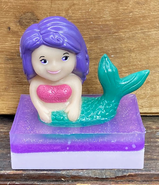 I am so excited that these toys are back in stock!  A beautiful Mermaid toy sits atop a bar of  Black Raspberry Scented Shea Butter and Glycerin soap.    Perfect for the little mermaid or princess in your life.  These would make perfect birthday party favors.   $8  Each item is individually made and may appear different from the photo.