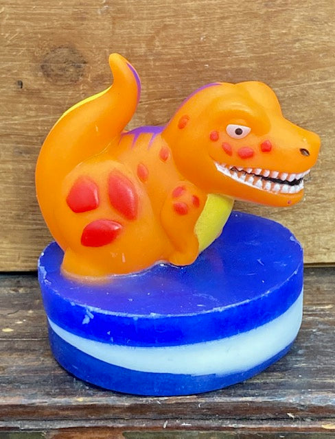 Back in stock!   A toy dinosaur on in a bar of Monkey Farts scented glycerin soap.  What kid doesn't want to take a bath in Monkey Farts with a dinosaur?  These would make awesome party favors!  $8  Each item is individually made and may appear different from the photo.  Each dinosaur toy is different and the soap may appear different from the photo.  