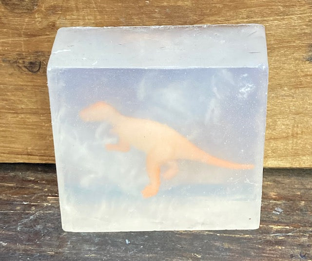 What could be better than a toy dinosaur encased in a bar of Monkey Farts scented glycerin soap.  A glow-in-the-dark toy dinosaur encased in a bar of Monkey Farts scented glycerin soap!!!!  Who doesn't want to take a bath in Monkey Farts with a dinosaur?  These would make awesome party favors!  $8  Each item is individually made and may appear different from the photo.  Each dinosaur toy is different and the soap may appear different from the photo.  
