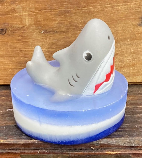 It might not be shark week, but that doesn't mean we can't play with sharks.  This is a shark finger puppet that sits atop a bar of Ocean Breeze Scented Shea Butter and Glycerin soap.    These would make perfect birthday party favors.   $8  Each item is individually made and may appear different from the photo. Sharks are available in different colors.