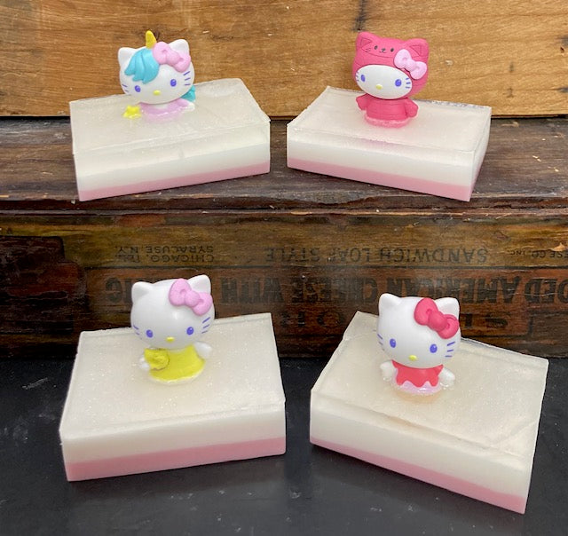This is a throwback to my childhood!  Hello Kitty toys on a bar of Bubble Gum scented Shea Butter and Glycerin soap.  There are 4 different toys to choose from.  $8 each.  Each soap is individually made and may appear different from the photo.  Toy may vary from the photo.