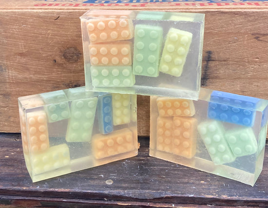 This is a bar of Monkey Farts scented glycerin soap embedded with Shea Butter Soap-shaped legos!  These would make an awesome addition to a birthday goody bag!   $7 each   Each item is individually made and may appear different from the photo.