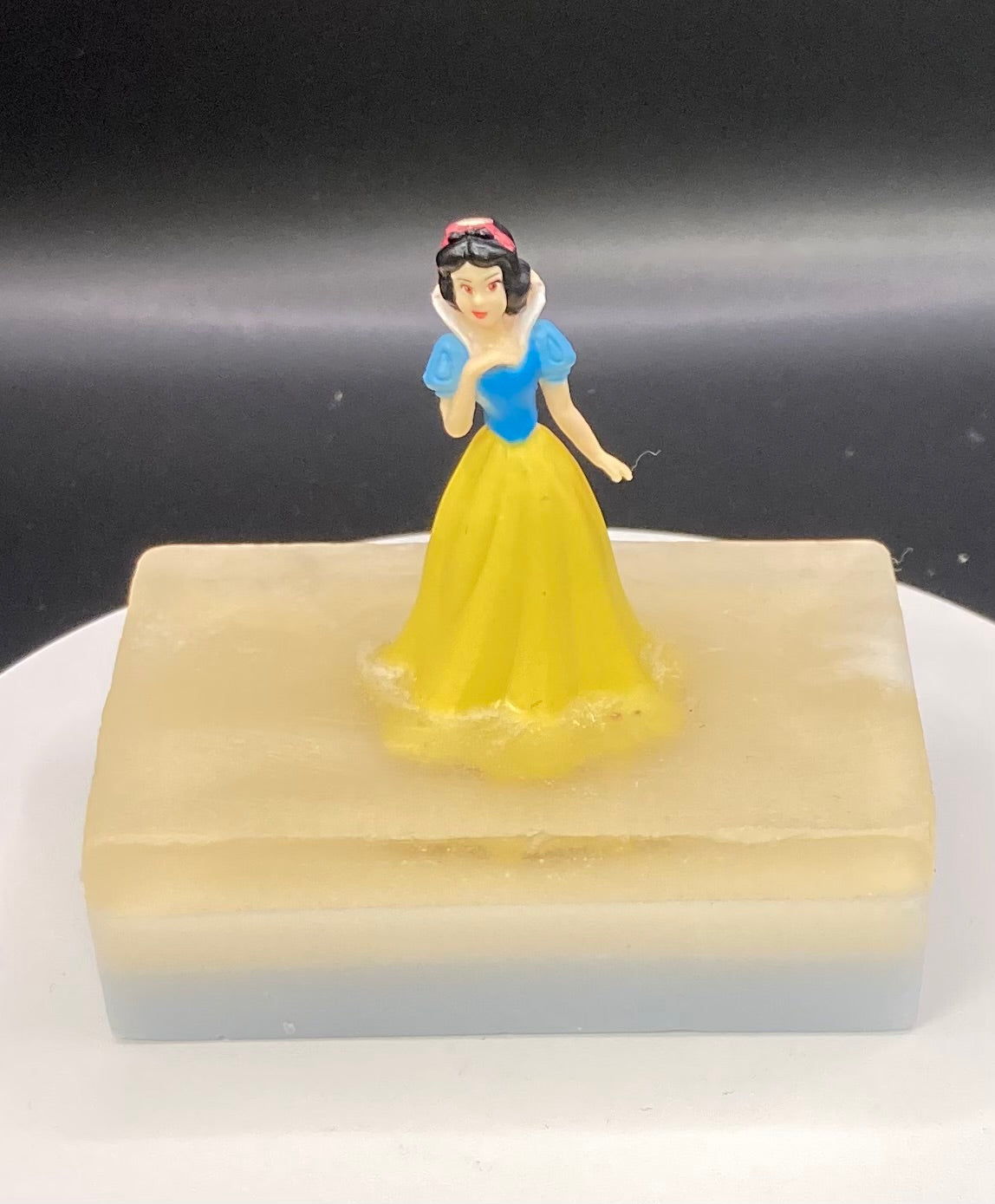 Snow White Toy on a Bar of Shea Butter and Glycerin Soap